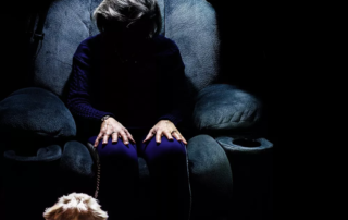 elderly woman sitting alone